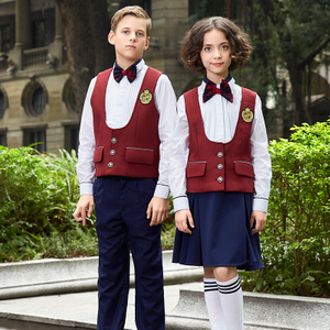 Los uniformes escolares rojos del chaleco modificaron la fuente de escuela modificada para requisitos particulares del muchacho y de las muchachas 